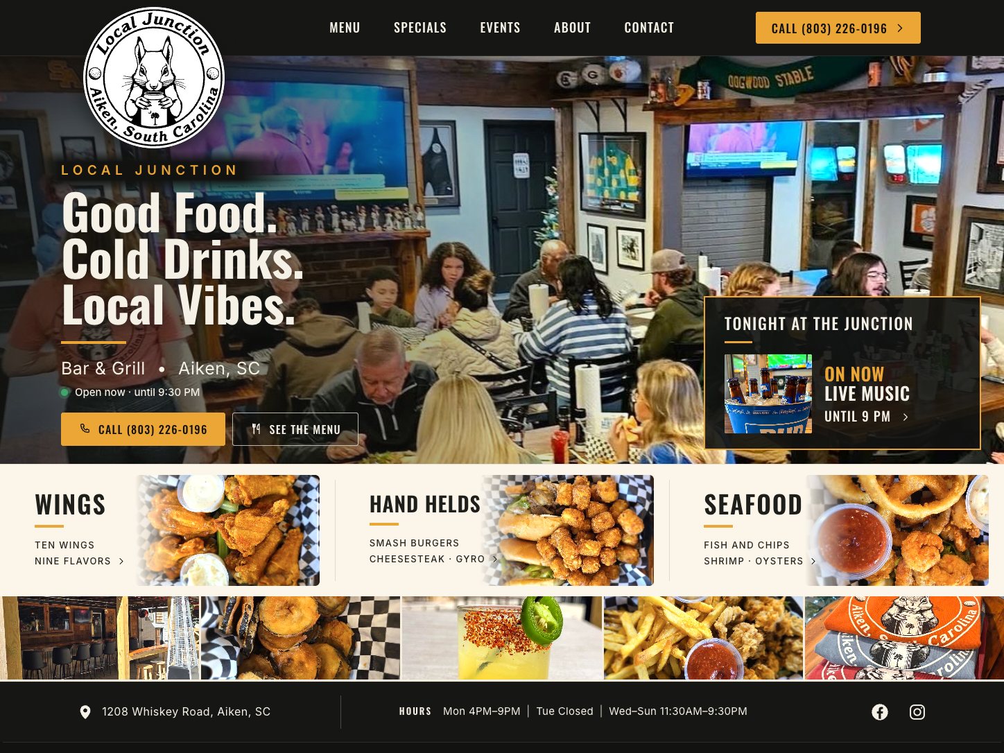 The Local Junction homepage — a full dining room under the game-day TVs, the headline Good Food. Cold Drinks. Local Vibes., and a Tonight at the Junction board.